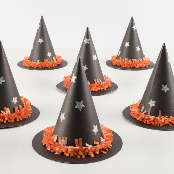 If you're looking for Halloween accessories you'll love these witch hats with bright tissue paper festooning.