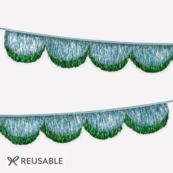 Use our blue and gren tinsel garland to make your Christmas celebrations and New Year parties look stylishly elegant. Image1