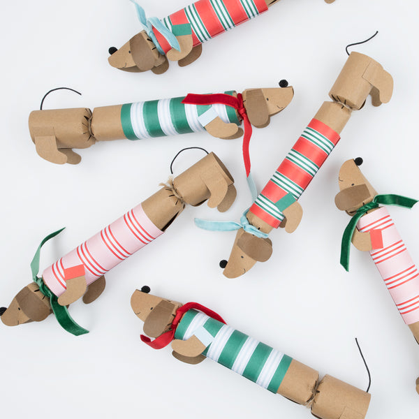 Our sausage dog Christmas crackers are utterly charming, and each contain a paper hat, joke and a sausage dog pin badget. Image4