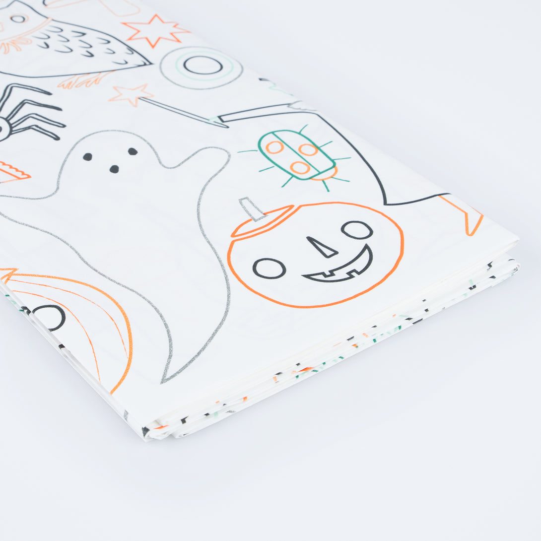 Our paper tablecloth, with colour in designs, is perfect for a kids' Halloween party. Image5
