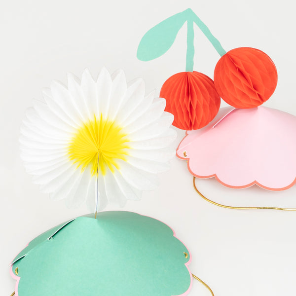 Our party hats feature flowers, cherries and stars, perfect for any special party. Image7