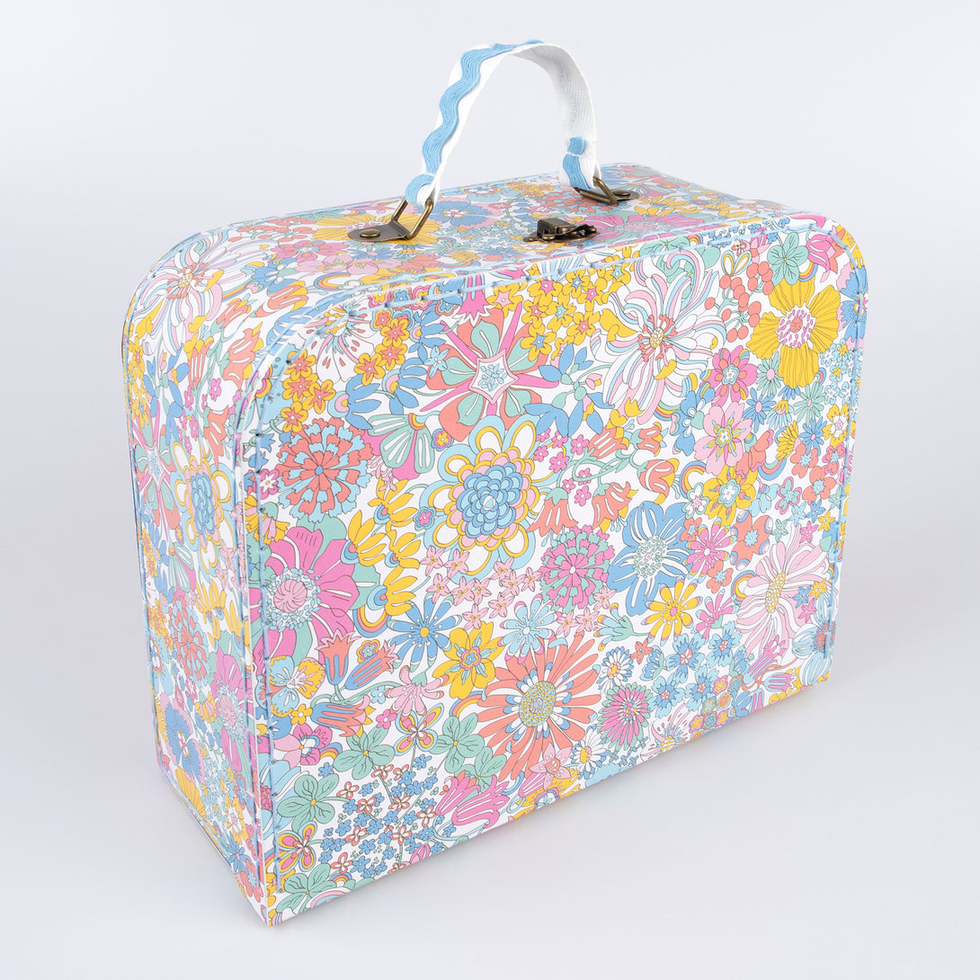 Our mini suitcases feature Liberty floral print designs and stitched card, so are sophisticated travel accessories and storage solutions.