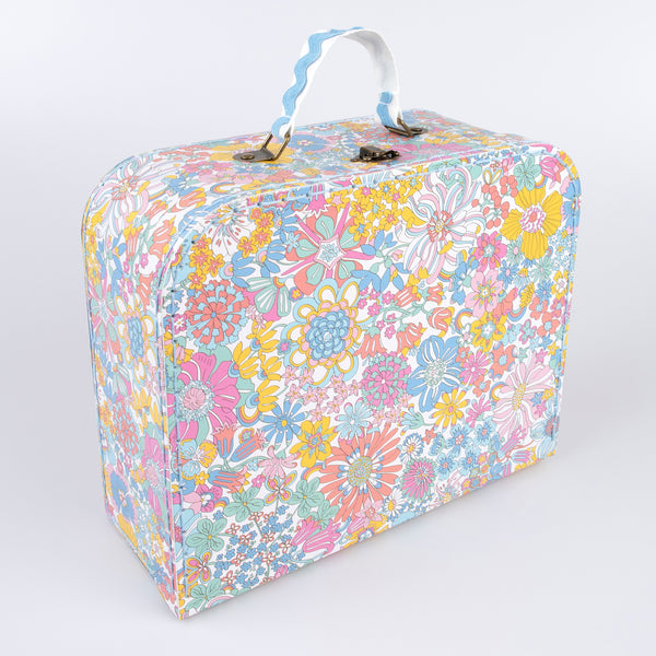 Our mini suitcases feature Liberty floral print designs and stitched card, so are sophisticated travel accessories and storage solutions. Image5