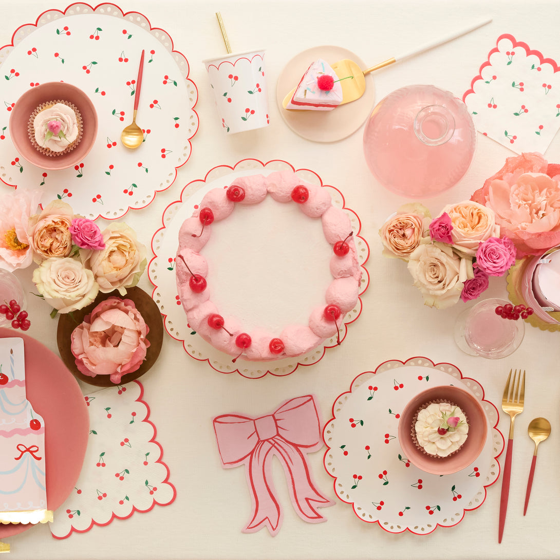 Our white and red paper plates feature a cherry design and broderie anglaise feel, perfect for a summery look.