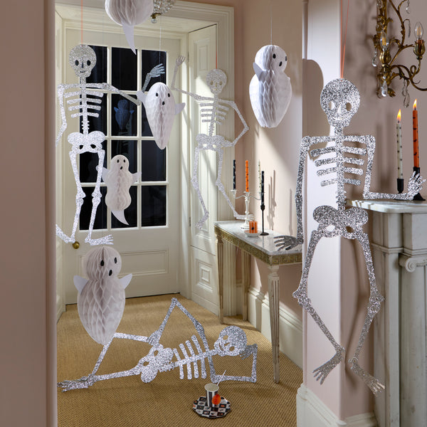 Our giant skeleton decorations are perfect for adding  fun statement to your Halloween celebration, with moveable joints and lots of silver glitter. Image2