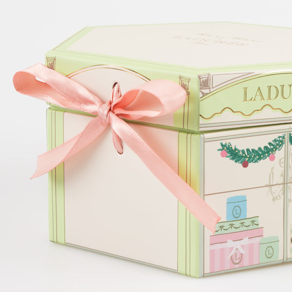 Kids who love accessories will adore our Laduree advent calendar which contains a charm bracelet, with enamel charms and cotton tassels. Image4