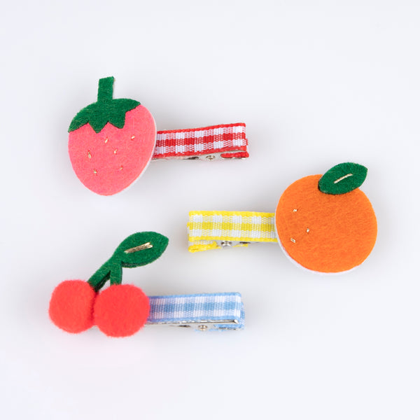 Our fruit hair clips are made from felt with fun pompoms and gingham ribbons for a really fabulous summery effect. Image4