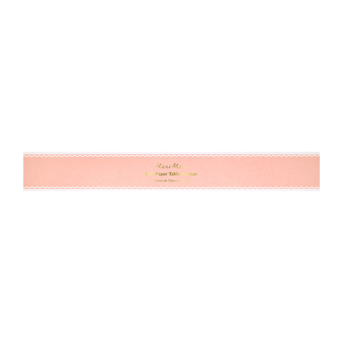 Our pink table runner, with a scalloped edge detail, is perfect to decorate any birthday party table, or for a baby shower.