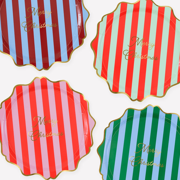 Our paper Christmas dinner plates have vibrant stripes, a Merry Christmas message, and gold foil details, great for main courses. Image1