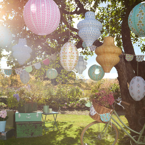 Our set of 3 hanging lanterns, with floral prints from Molly Mahon, are wonderful paper decorations for the home or parties. Image2