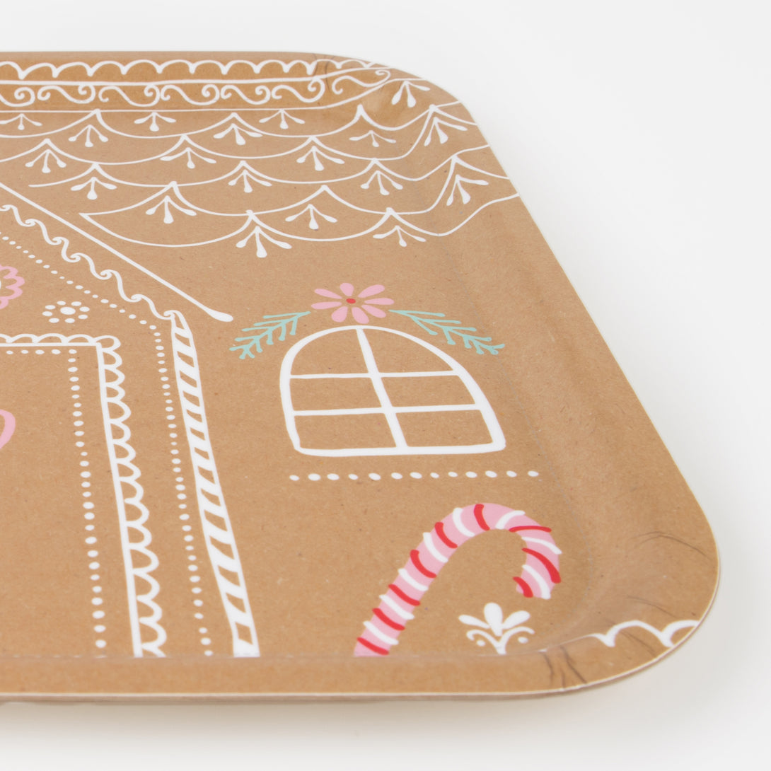 Our Christmas tray is designed to look like a gingerbread house, and is perfect to place food and drinks or, or to use as a craft tray.