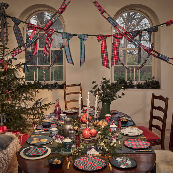 Our Christmas garland features tartan ribbon links, in classic festive colours, for a sophisticated decoration with a nod to nostalgia. Image2