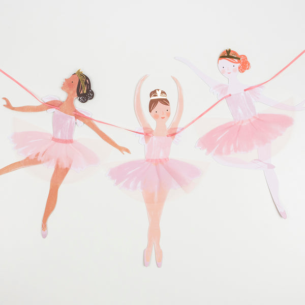 This set includes ballerina decorations for a birthday party, and tableware and a cupcake kit.  Image2