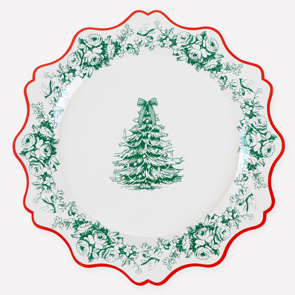 Our Christmas dinner plates, made from heavyweight paper, feature a fancy Toile de Jouy print and a red ornate border for a stylish look. Image1