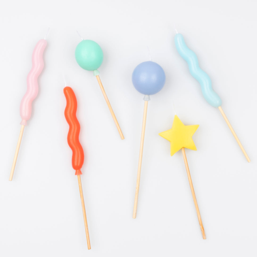 Our birthday candles are great as birthday cake decorations, featuring balloon shapes and bright colours.