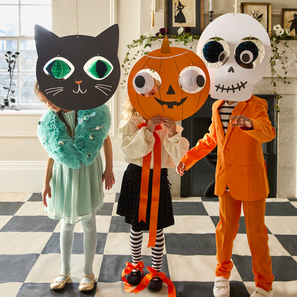 Our Halloween hanging decorations feature a skull, cat and Halloween pumpkin, with happy faces and 3D dangling eyeball details. Image2
