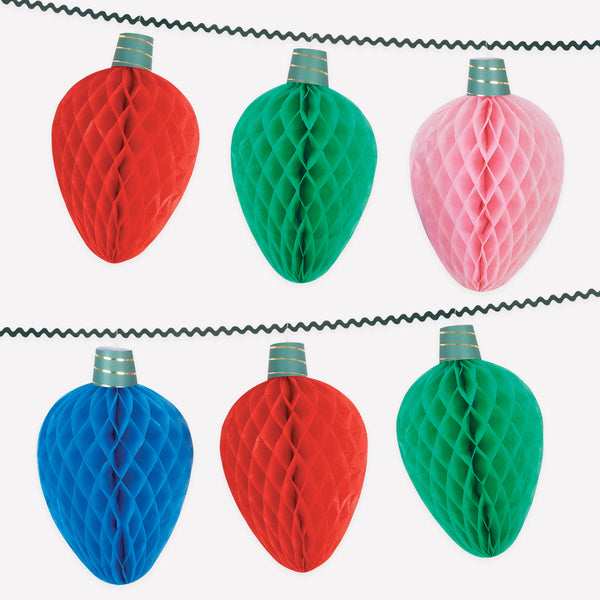 Our Christmas garland, made from honeycomb paper, features 3D details of fairy light designs in festive colours. Image1