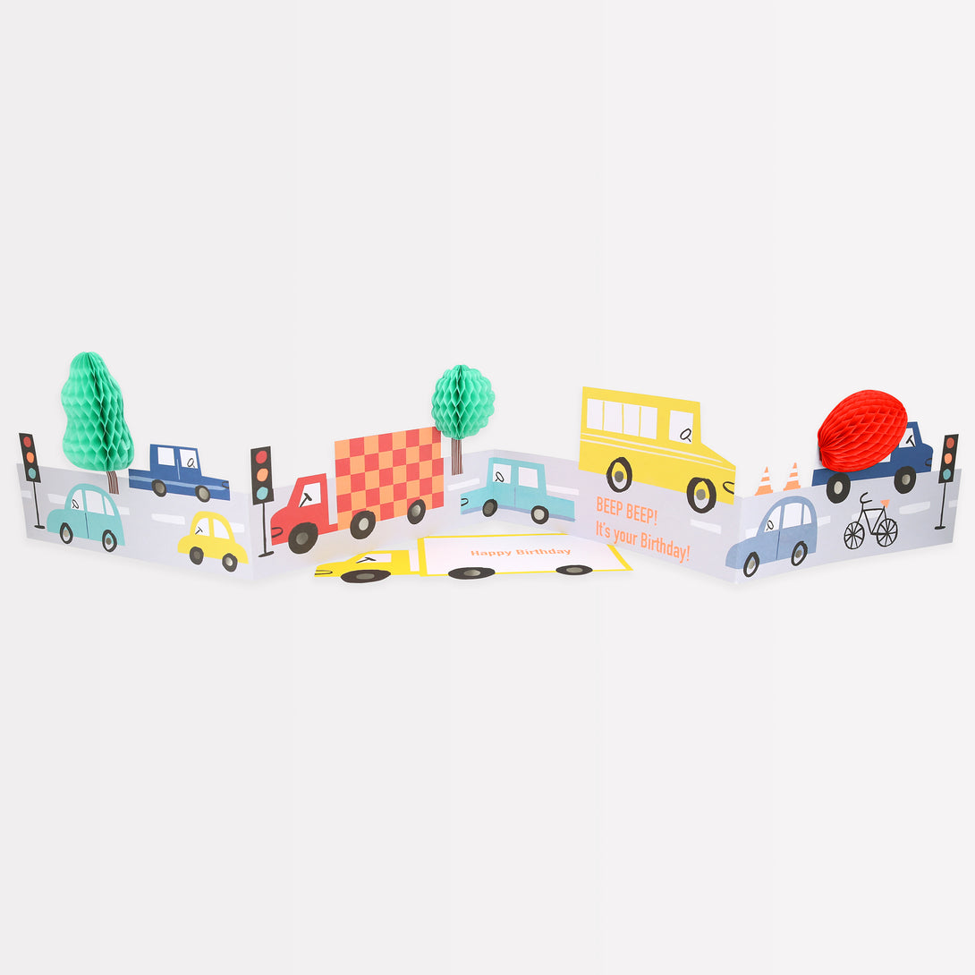 Our concertina card, with lots of colourful vehicles, is the perfect birthday card for a transport-themed party.