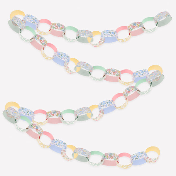 Our paper chain decorations set features Liberty floral designs and soft spring colours, perfect for Easter decorations and beyond. Image1