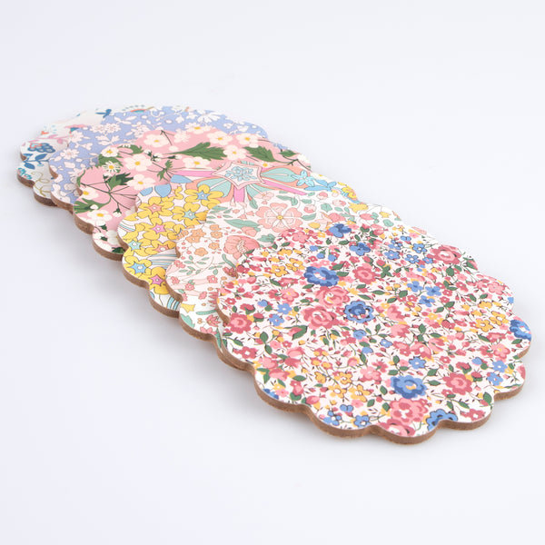 Our wooden coasters are made from a composite wood with floral Liberty prints, a laminated finish and a cork backing. Image3