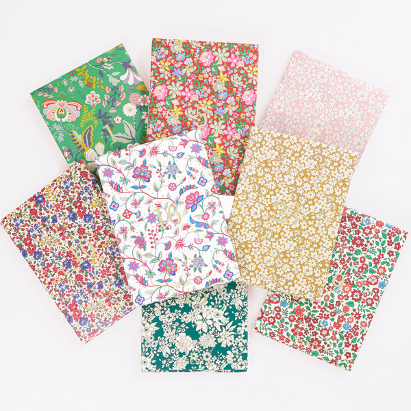 Our advent calendar is beautifully presented in a large Liberty print design box with 24 boxes inside containing stationery and decorations. Image6