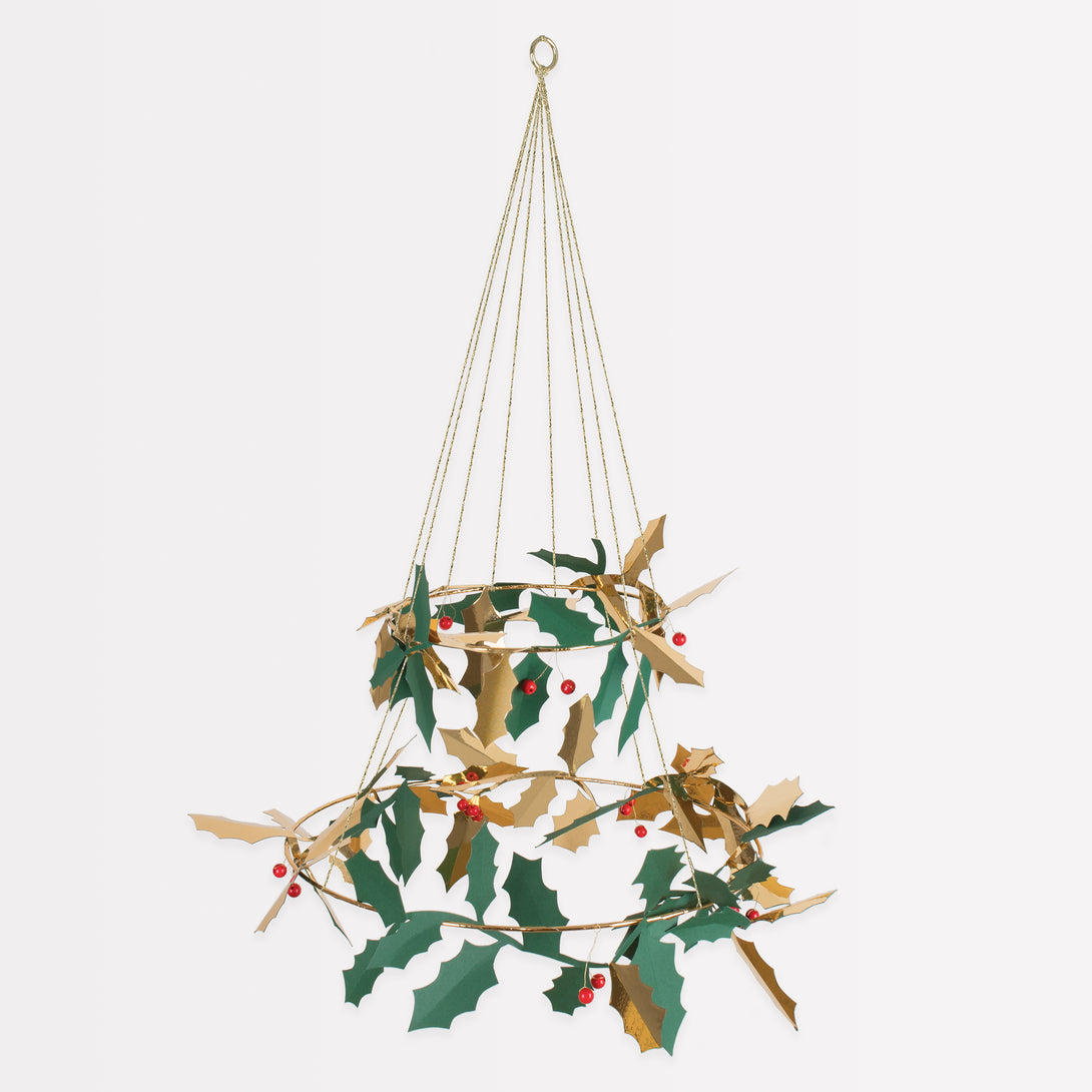 Our holly chandelier, made with metal, wood and paper, makes a beautiful hanging Christmas decoration.