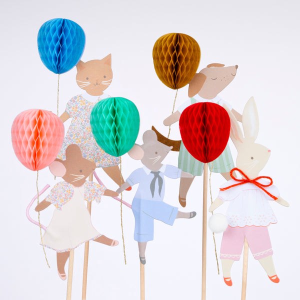 Our cake toppers feature animals with honeycomb balloons  and fun embellishments, to make your baby shower or birthday party look great.