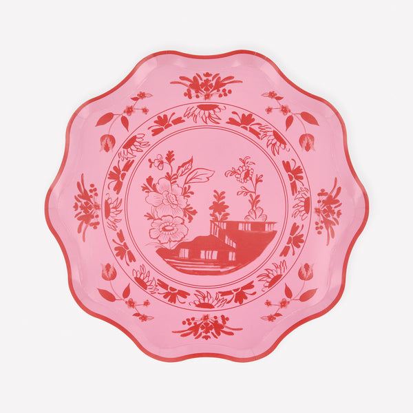 Our paper plates, in two beautiful pink shades, feature a bridge and botanical illustrations, reminiscent of classic dinnerware patterns. Image1