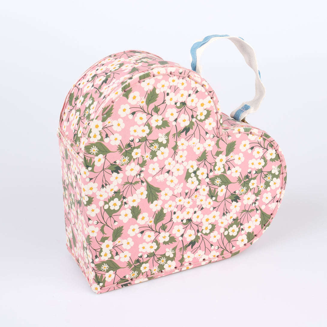 Our mini suitcases feature pretty Liberty floral prints in pink tones, fabulous for kids aged 3+ and adults, for travel and storage.