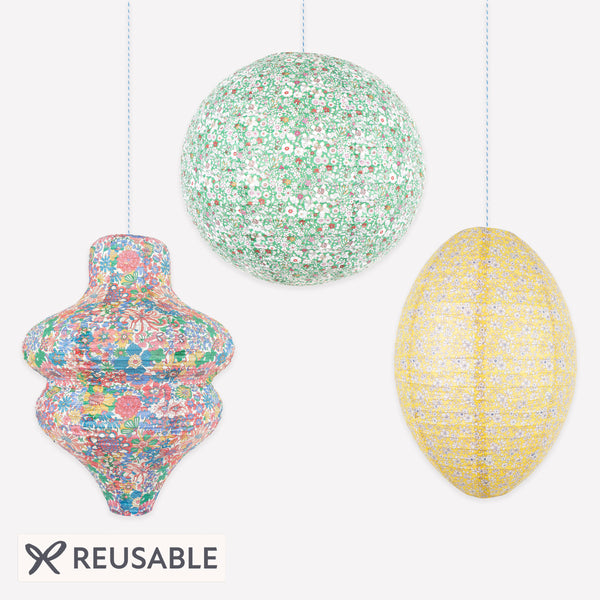 Our paper lantern set has a set of three, in a wavy, round and oval shape, each with a different Liberty floral print design, great for parties. Image1