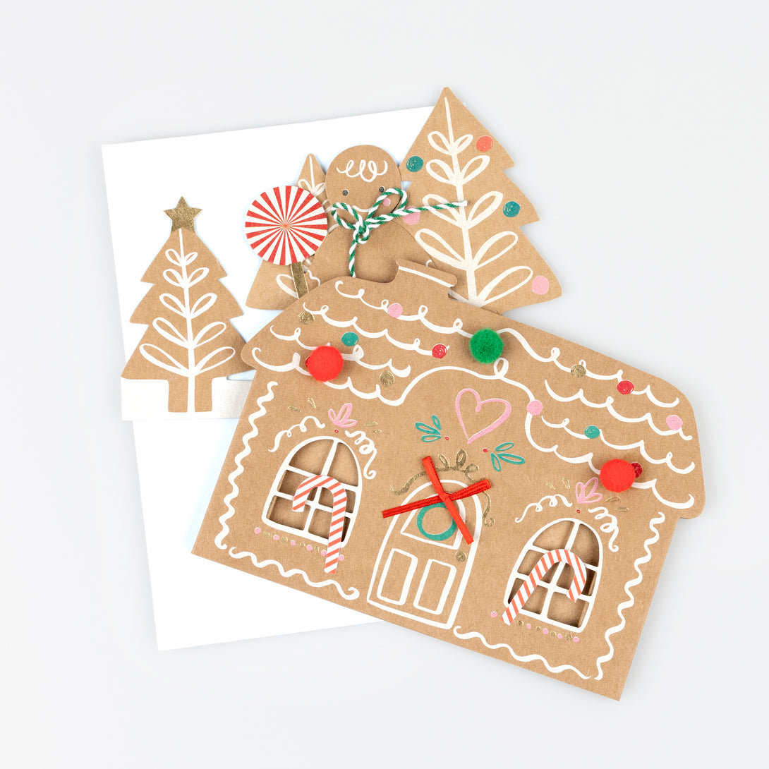 Our embellished pop up Christmas card is a charming way to send festive cheer and give a delightful mantel decoration. Image2