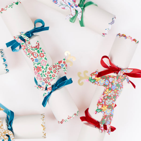 Make your Christmas dinner table look elegant with our luxury reindeer crackers with Liberty prints, velvet bows and a wonderful decorative gift. Image4