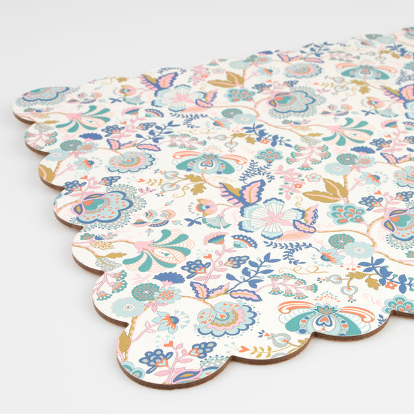 Our large placemat is crafted in a rectangular shape with a scalloped edge, pretty floral Liberty print design, cork back and laminated finish. Image3