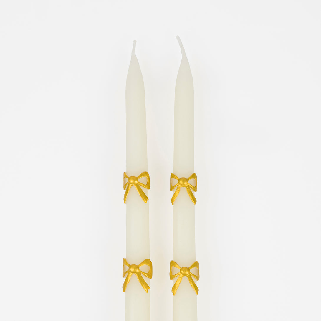 Our taper candles, with a bow design, are perfect as Christmas decorative candles.