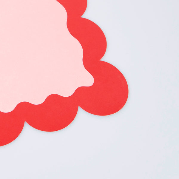 Our paper placemats are crafted in Christmas colours of red and green, with a modern pop of pink, and stylish scalloped edges. Image5