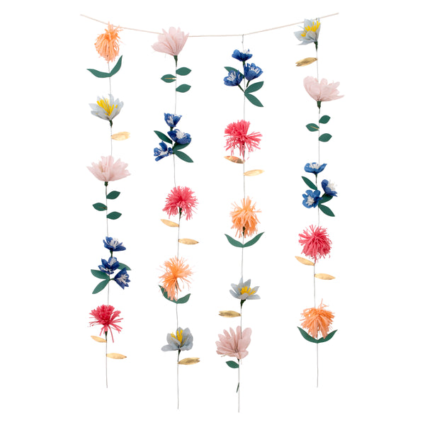 This fabulous flower decoration is crafted from colourful tissue paper flowers, with gold foil  and green leaves. Image1