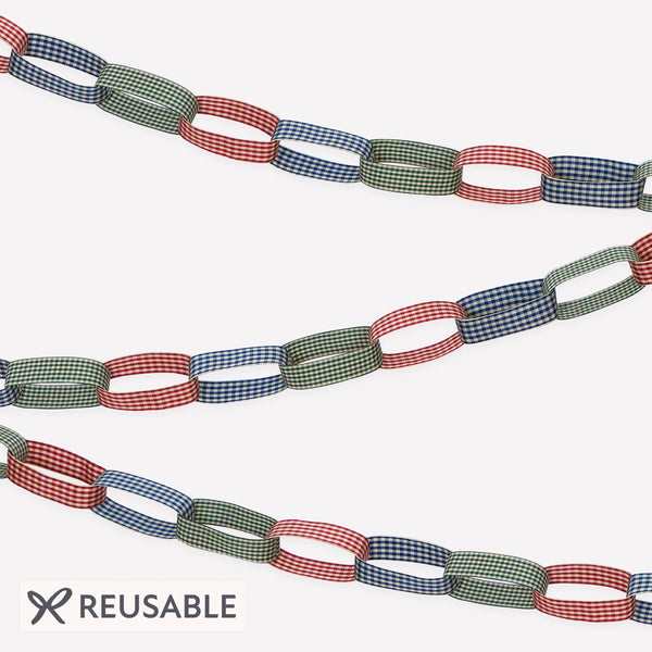 Our Christmas garland features gingham ribbons chain linked to create a current yet classic decoration for the mantel, stairs, window or table. Image1