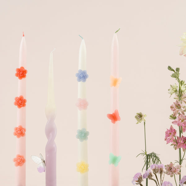 Make any pink party look amazing with our taper candles with pink flowers and pink wicks. Image2