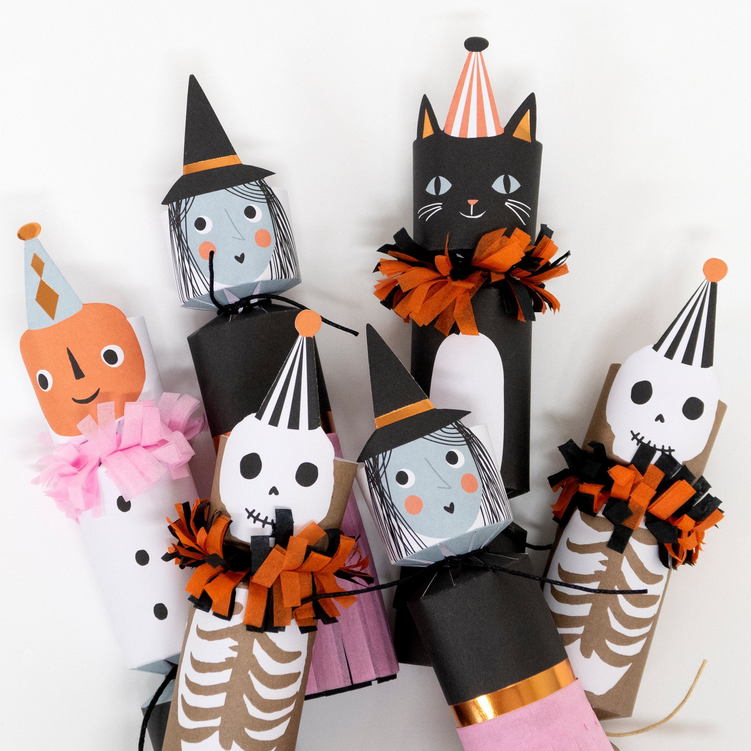 These crackers are filled with sensational Halloween gifts, and decorated with Halloween icons.
