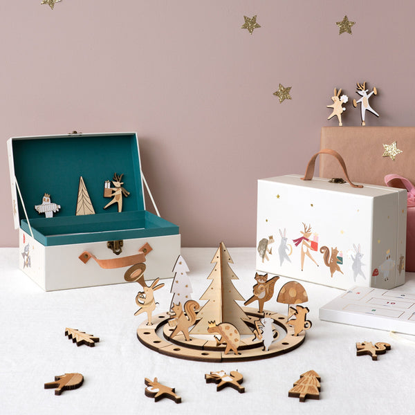 Our kids advent calendar, in a suitcase, features wooden toys for hours of play.