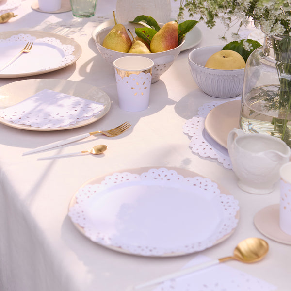 Our paper side plates have a pretty lace design, with embossed details, ideal as baby shower plates. Image2