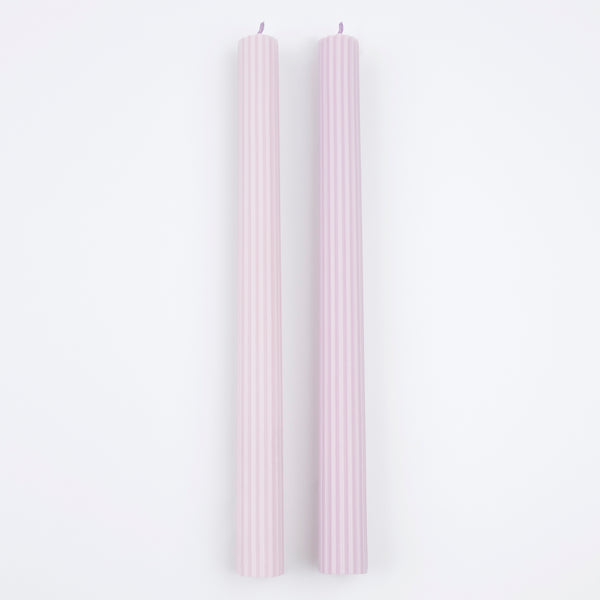 Our tall candles, in a lilac colour, are perfect for any party with a purple theme.
