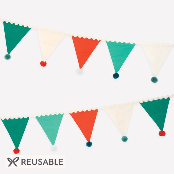 Add our fabric garland, with fun pompom details, to your Christmas party supplies as it makes an amazing and reusable decoration. Image1