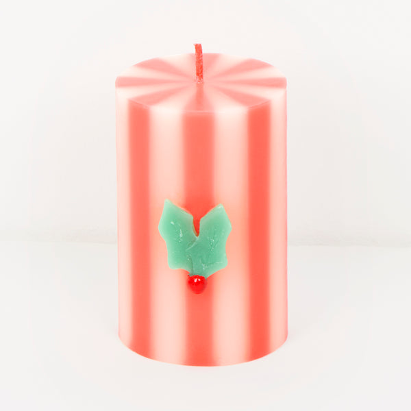 Our Christmas candles, in a stylish pillar shape, feature, green, red, white and pink stripes, with wax icons and elegant coloured wicks. A great gift. Image2