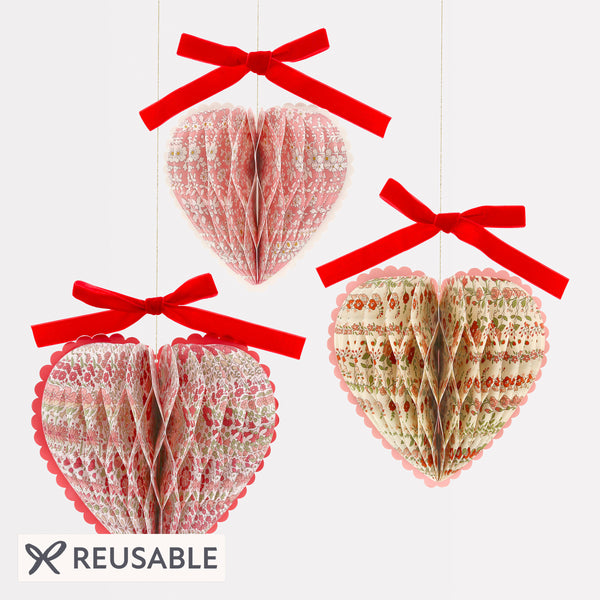 Our honeycomb hearts make wonderful Valentine's decorations. They're made with Liberty floral print designs and elegant velvet bows. Image1