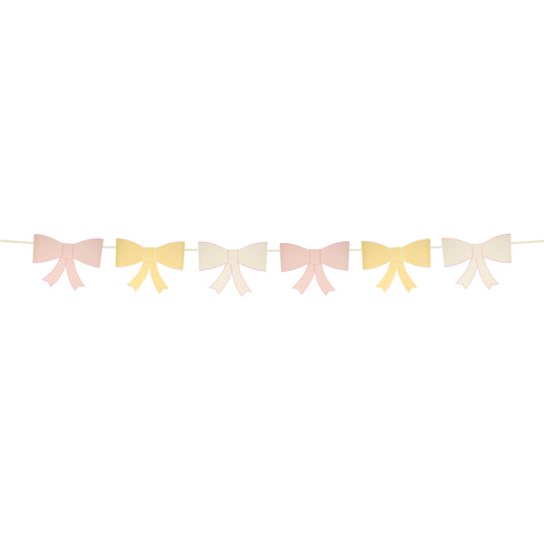 Our large garland, with big bows in soft colours, is perfect as a wall decoration. Image6