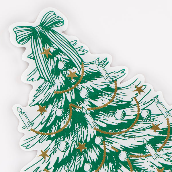 Our Christmas napkins, made 3-ply paper, are made in the shape of a Christmas tree with a Toile de Jouy inspired design and gold foil details. Image3