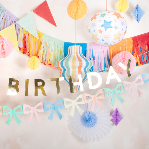 Our birthday garland, in shiny gold letters, is a great birthday party decoration to place on the party table, wall, mantel or doorway. Image2
