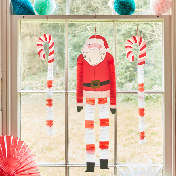 Our large Christmas hanging decorations include Santa, a reindeer and candy canes, with fun honeycomb details for a stunning effect. Image2
