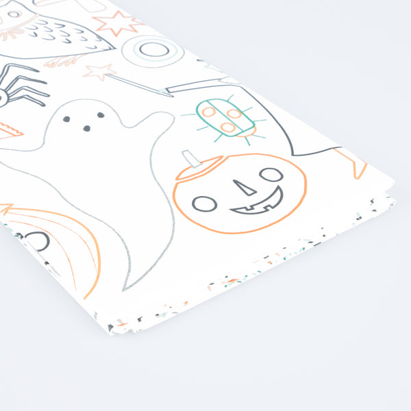 Our paper tablecloth, with colour in designs, is perfect for a kids' Halloween party. Image2